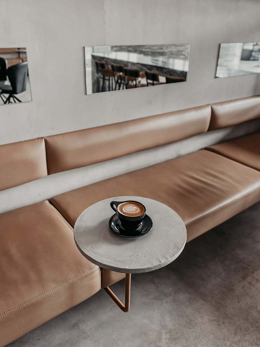 furniture black and white ceramic plate on brown wooden table coffee table