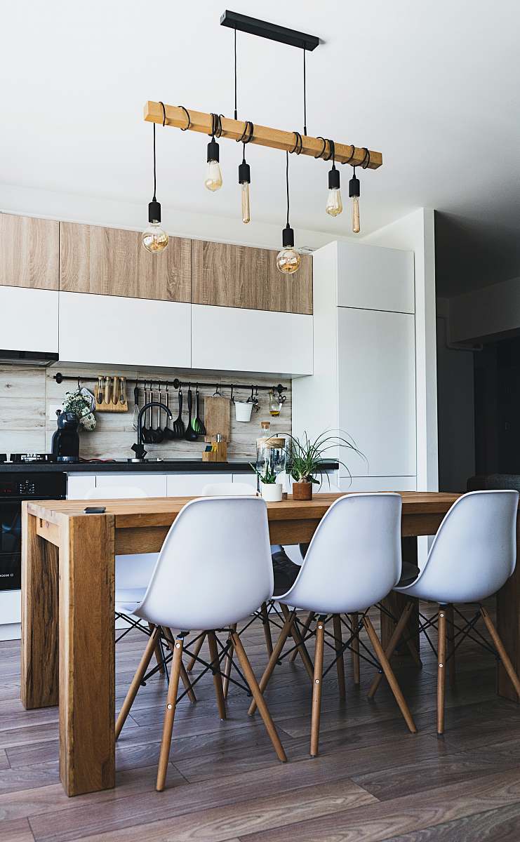 chair brown wooden dining table with white chairs near kitchen kitchen