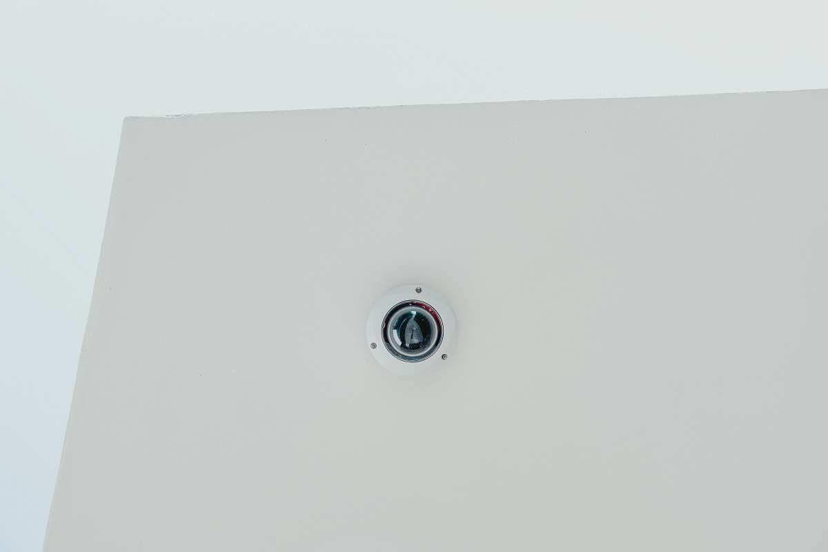 belgium white and black dome security camera grey