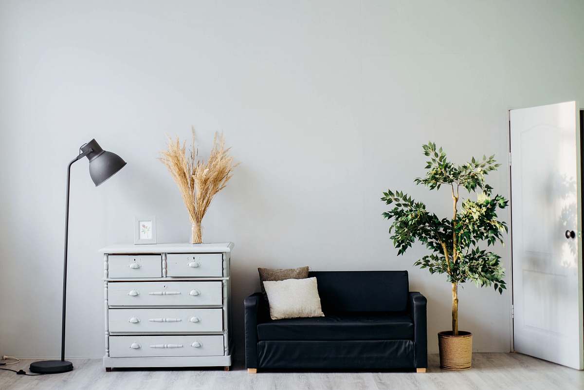 furniture dresser beside sofa tree