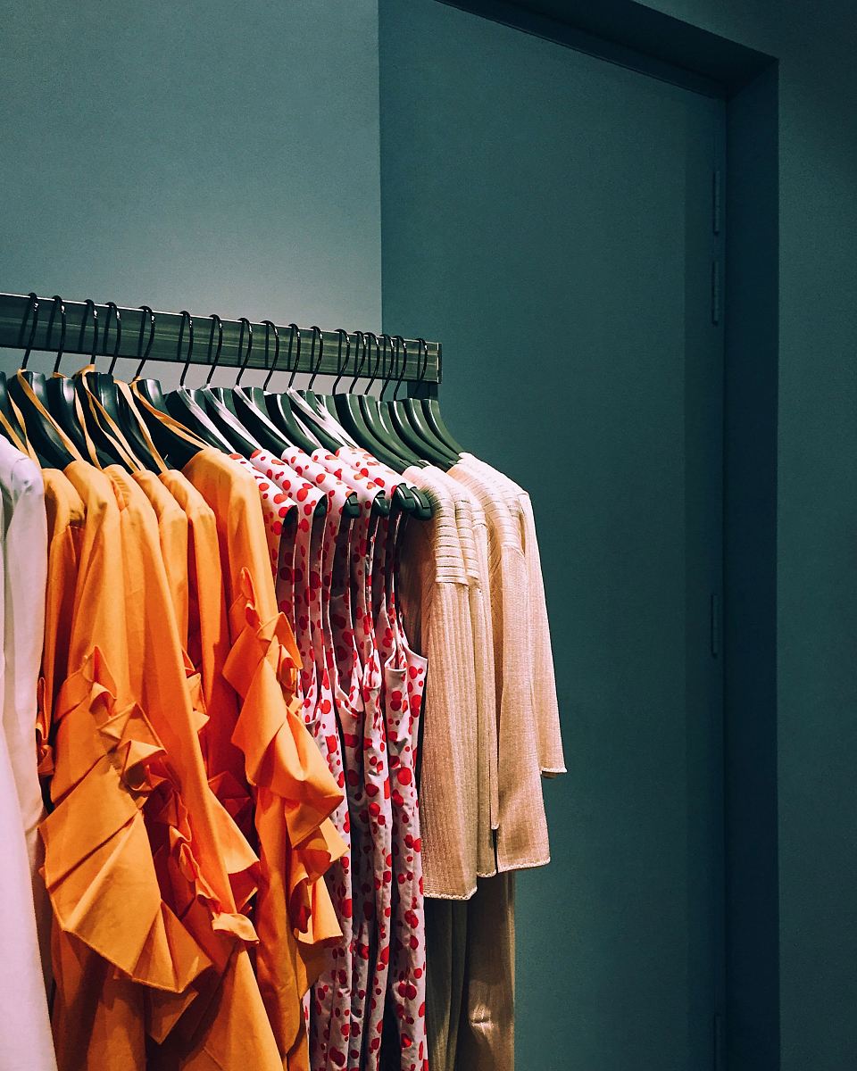 assorted-color shirt lot hang on rack