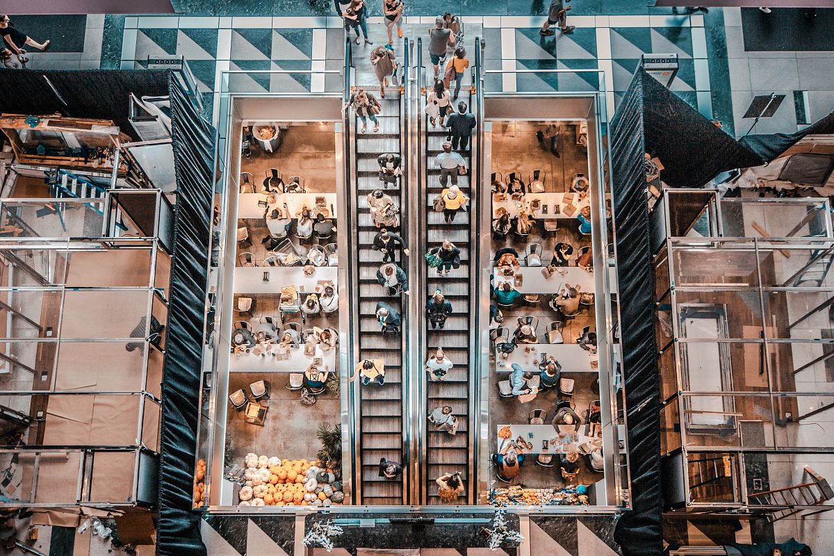 birds eye photography of people walking in stair