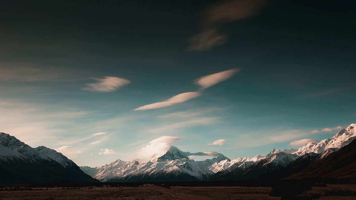 gray mountains under gray sky