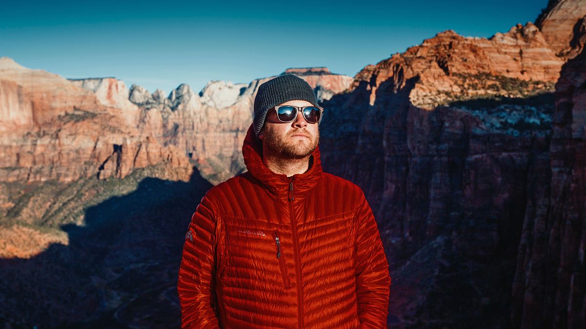 man in red full-zip hoodie