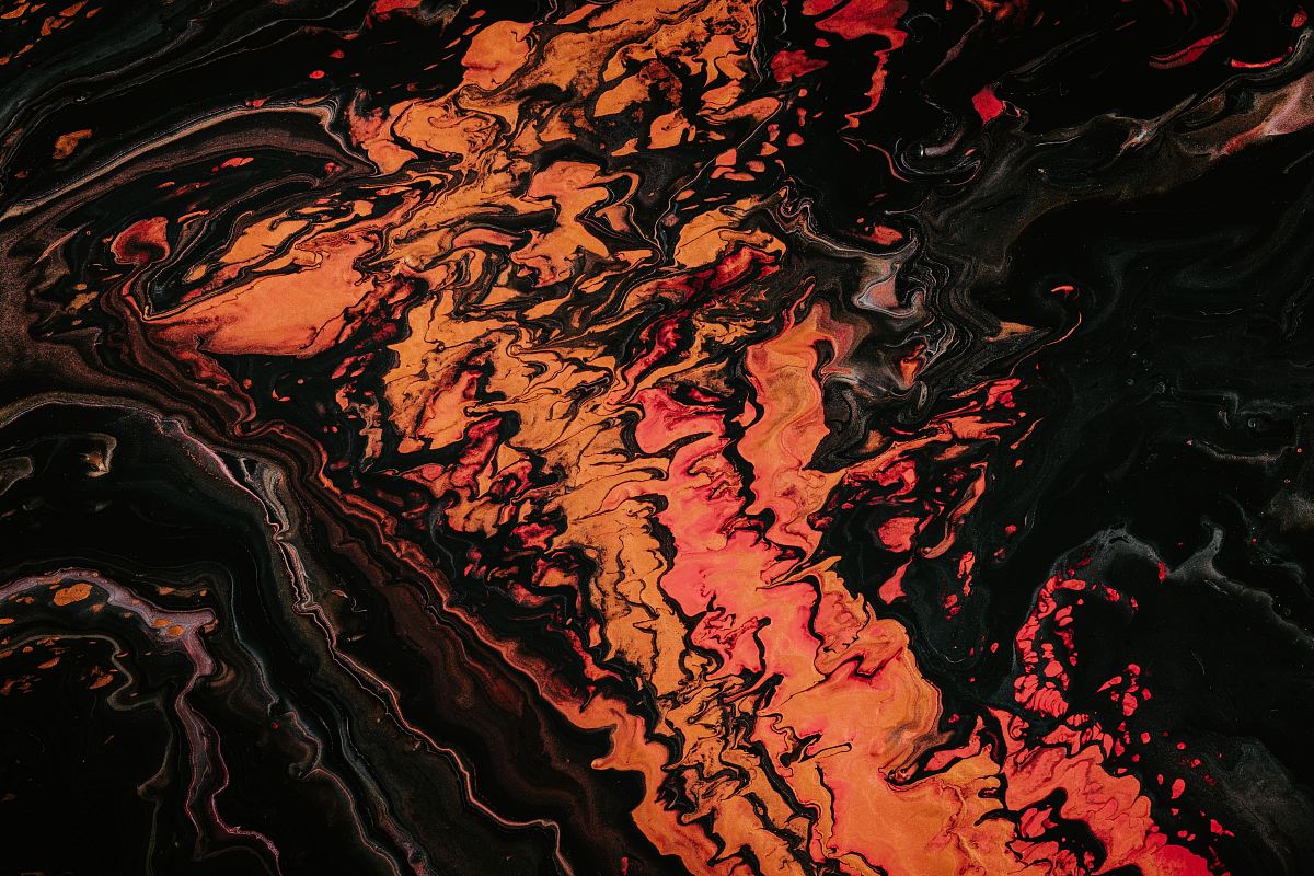 orange and black fluid abstract painting