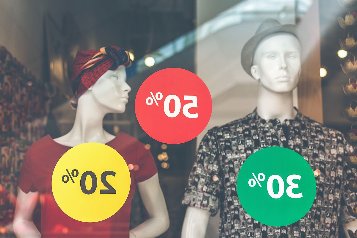 two male and female mannequin wearing clothes