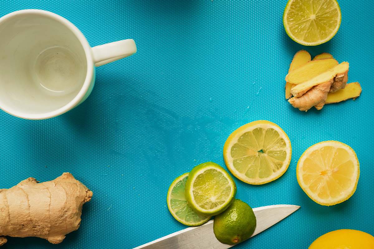 food sliced lemon on white ceramic mug citrus fruit