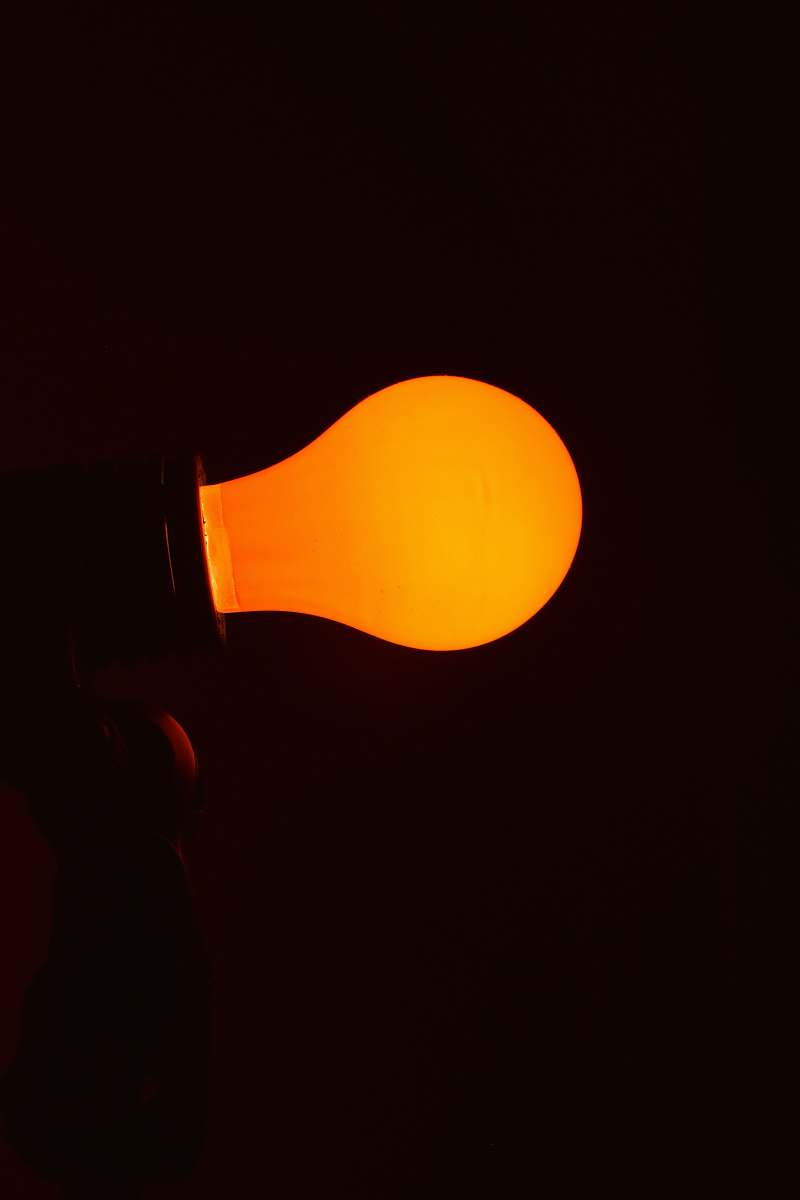light lighted orange CFL bylb lightbulb