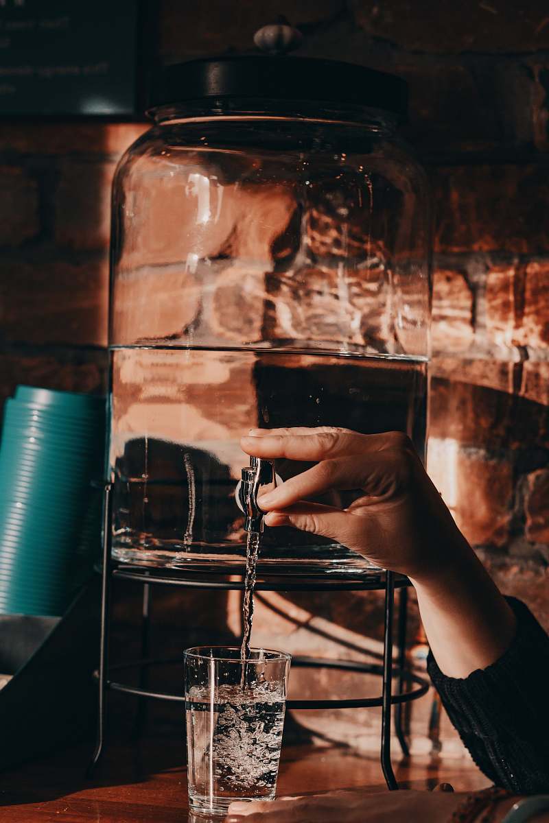 human clear drinking glass glass
