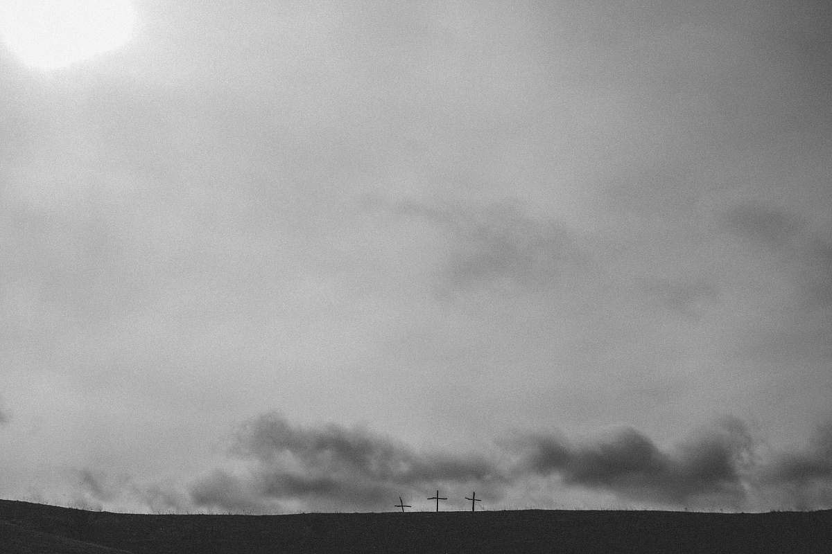 grey three cross under cloudy sky easter