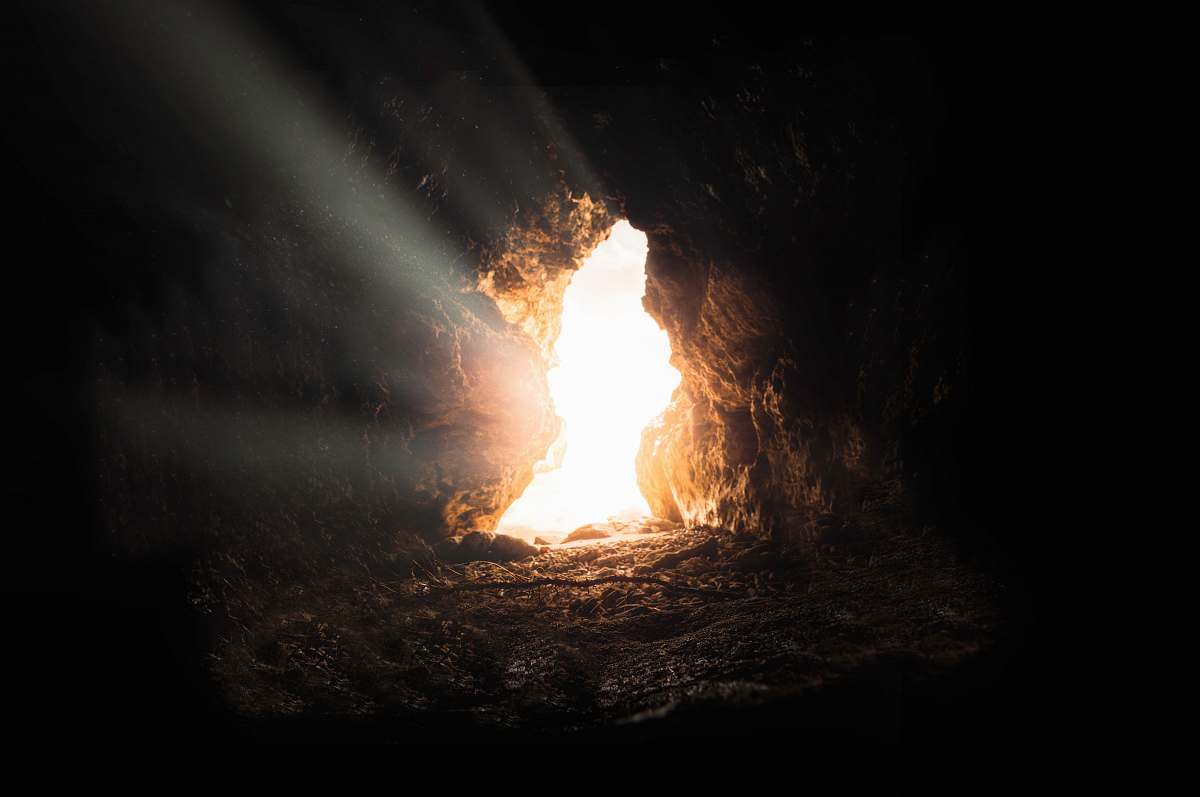 cave sun rays inside cave curacao