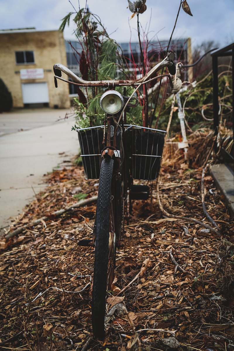vehicle black cruiser bike parking near road bike