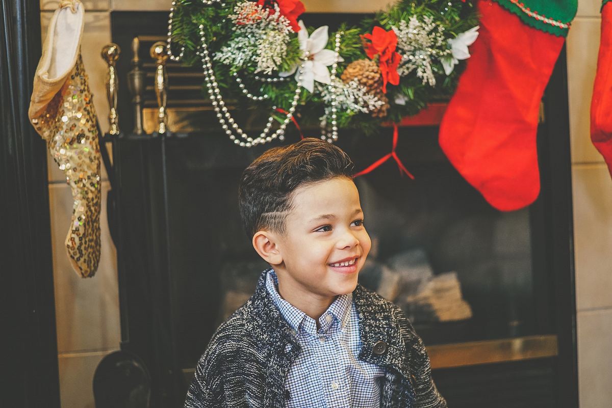 boy wearing gray collared top