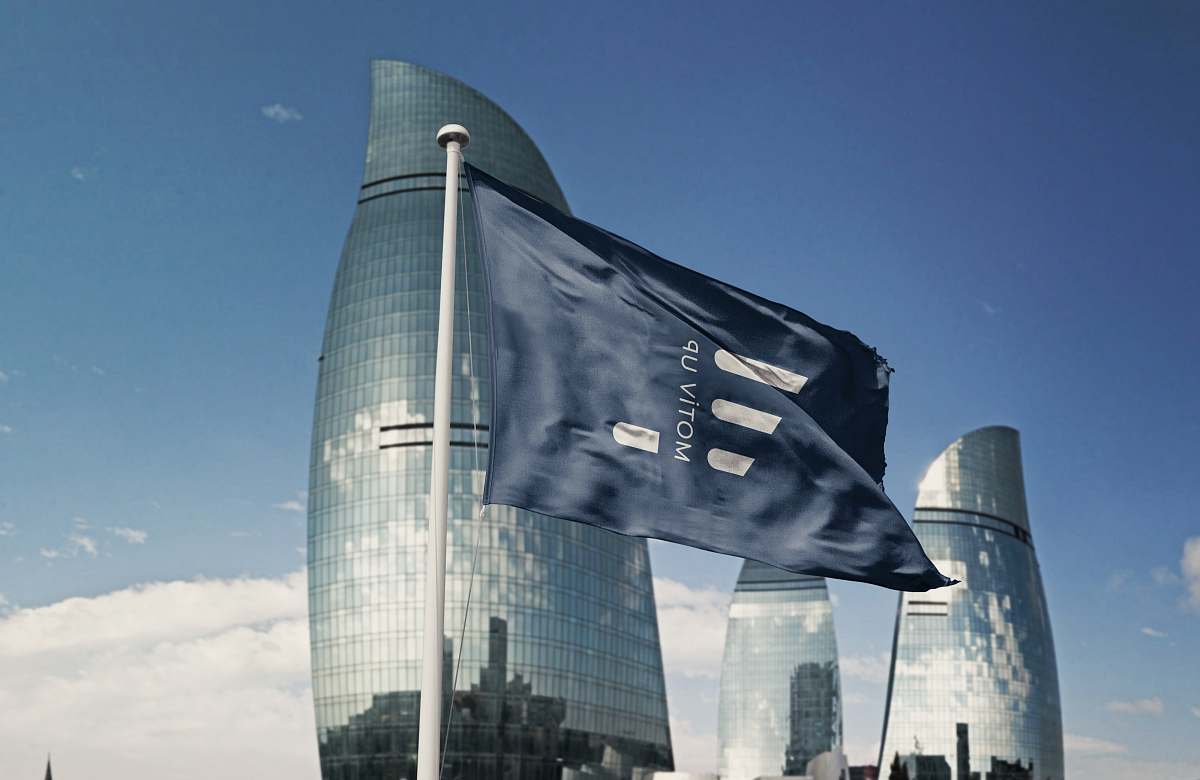 symbol blue and white flag on pole during daytime building