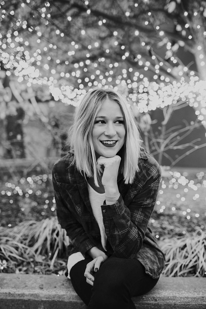 grayscale photography of woman wearing plaid sport shirt