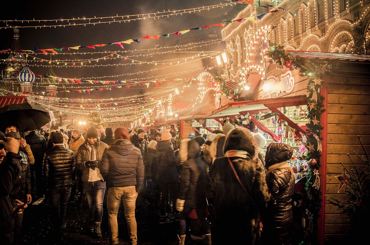 group of people standing near amusement park