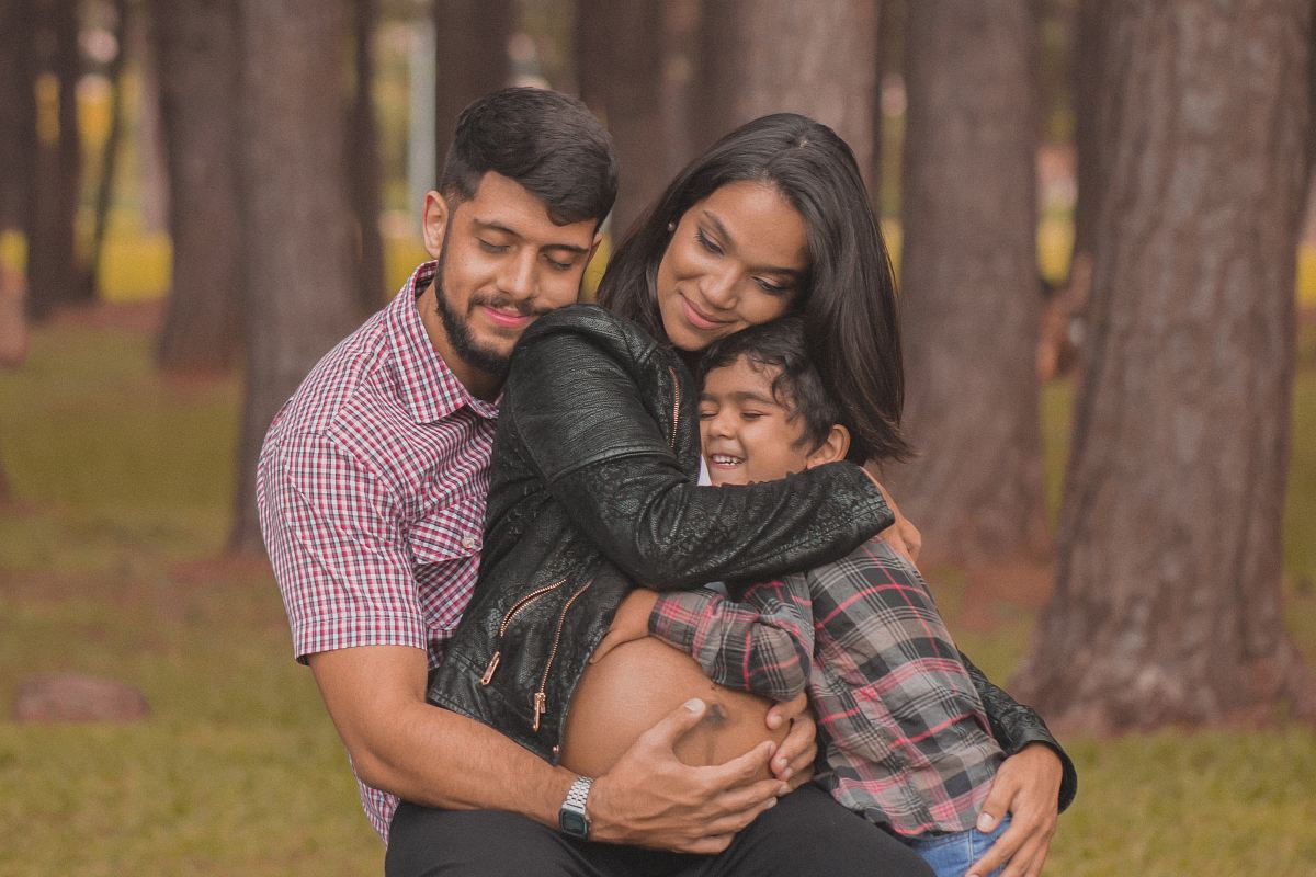 man hugging a woman