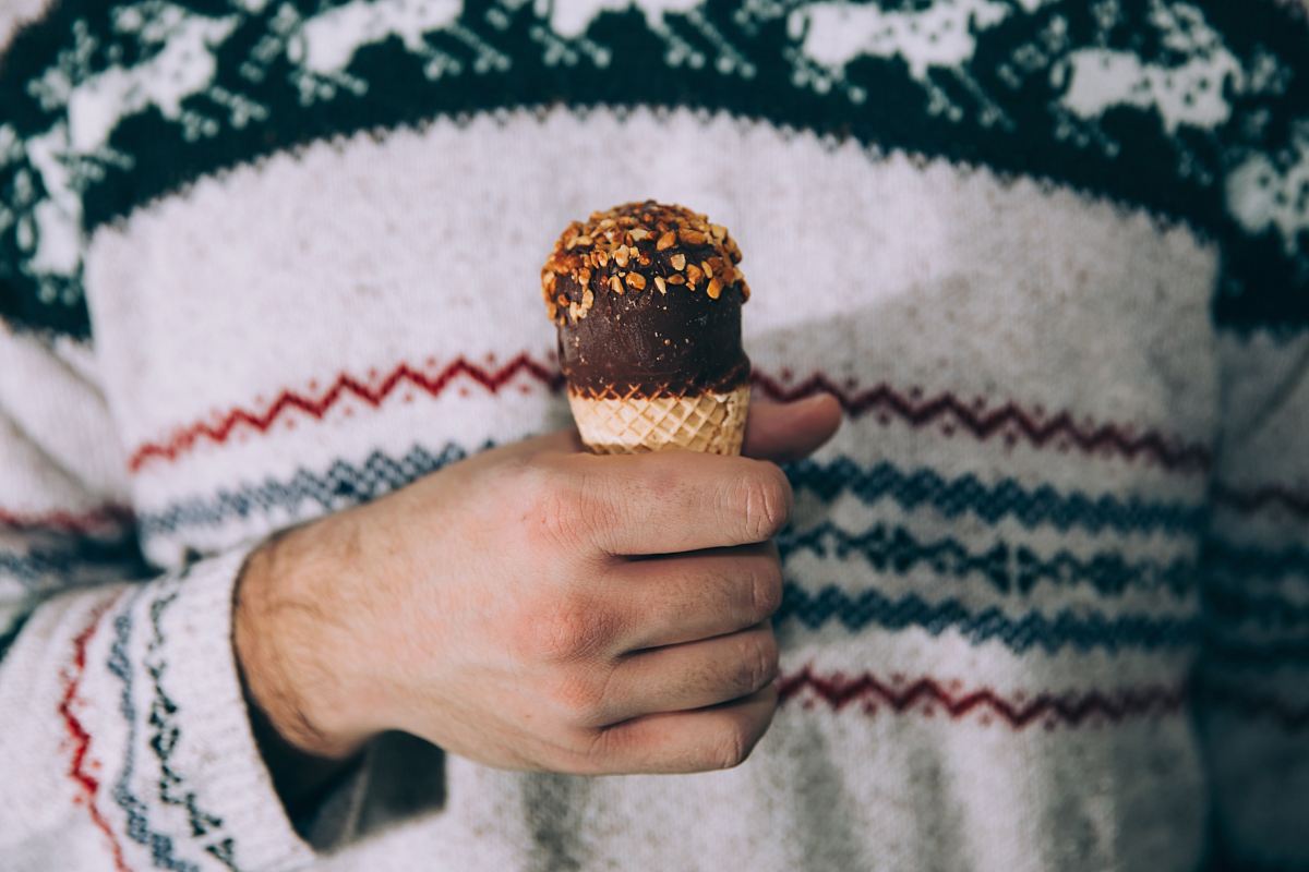 person holding ice cream cone