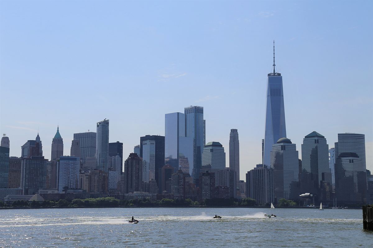sea and city during day
