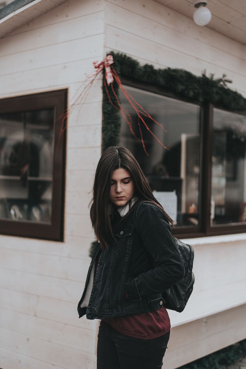 woman standing near store during daytime