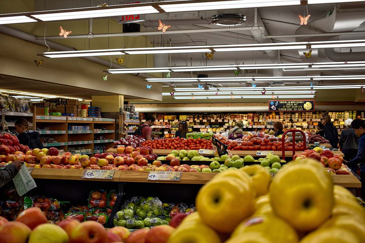 person apple fruit lot market