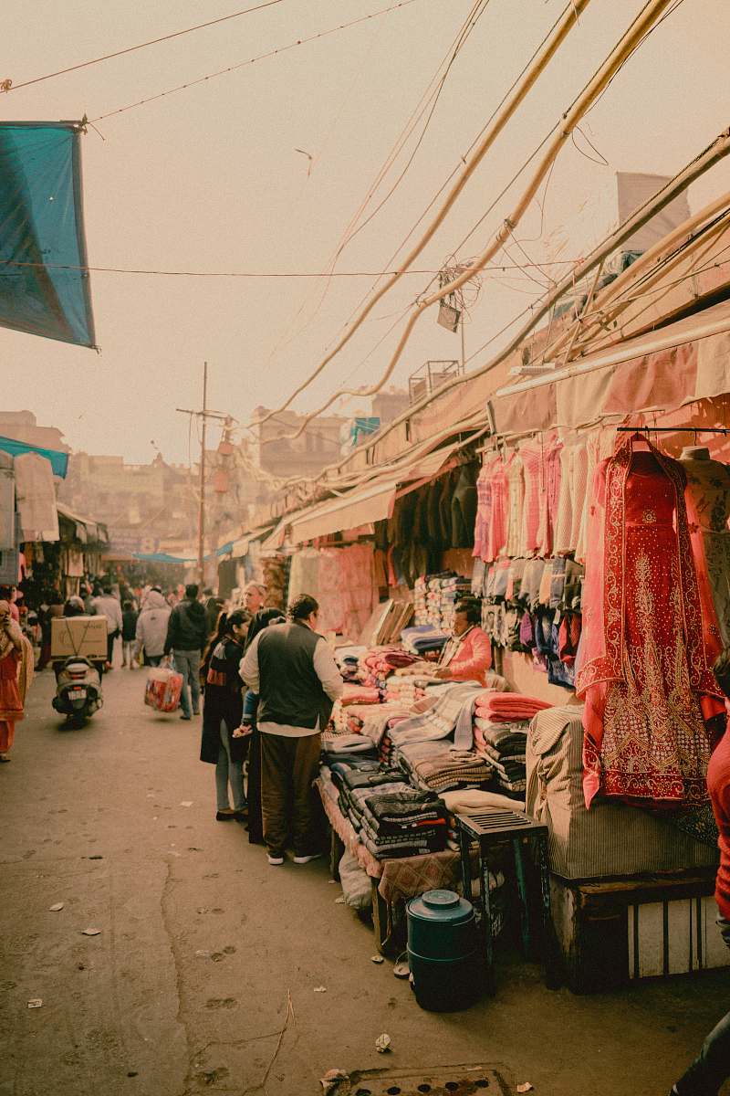 person people and shops during day market