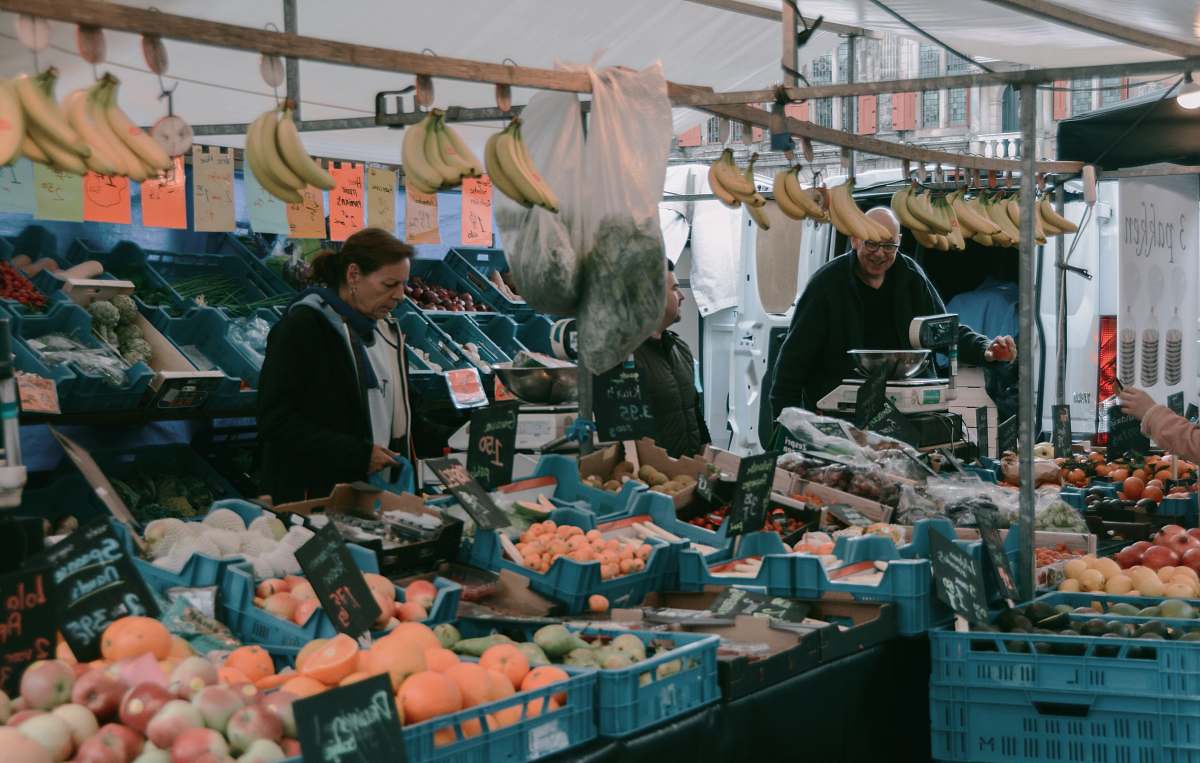 market people in a market close-up photography fruit