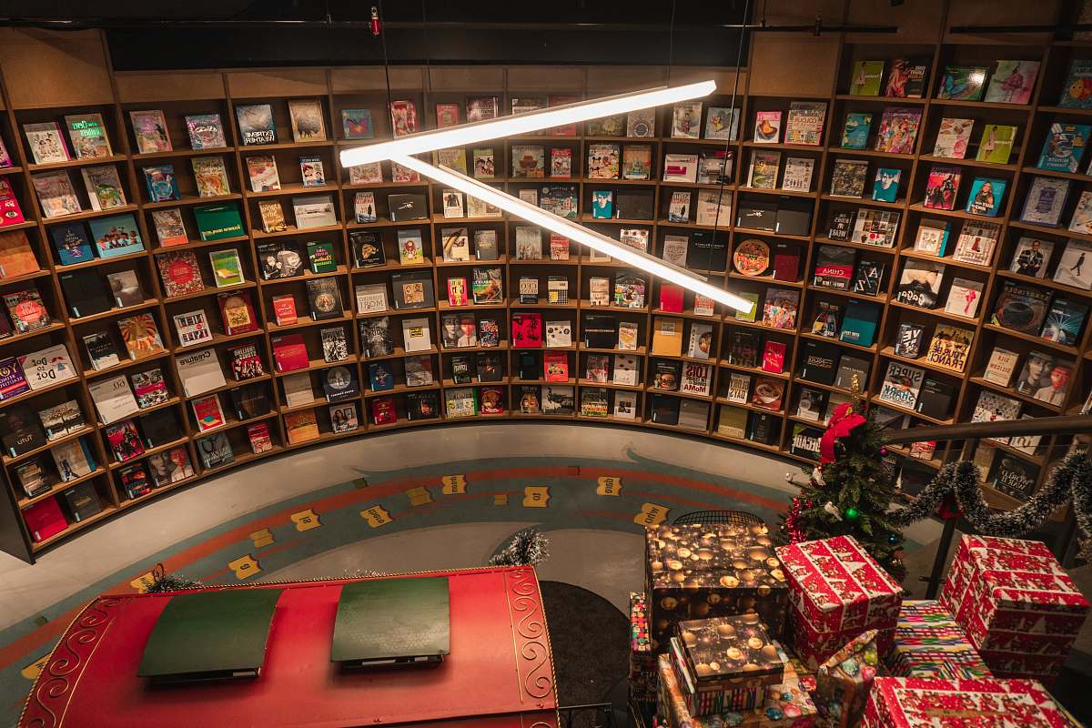 book room with racks of boxes bookstore