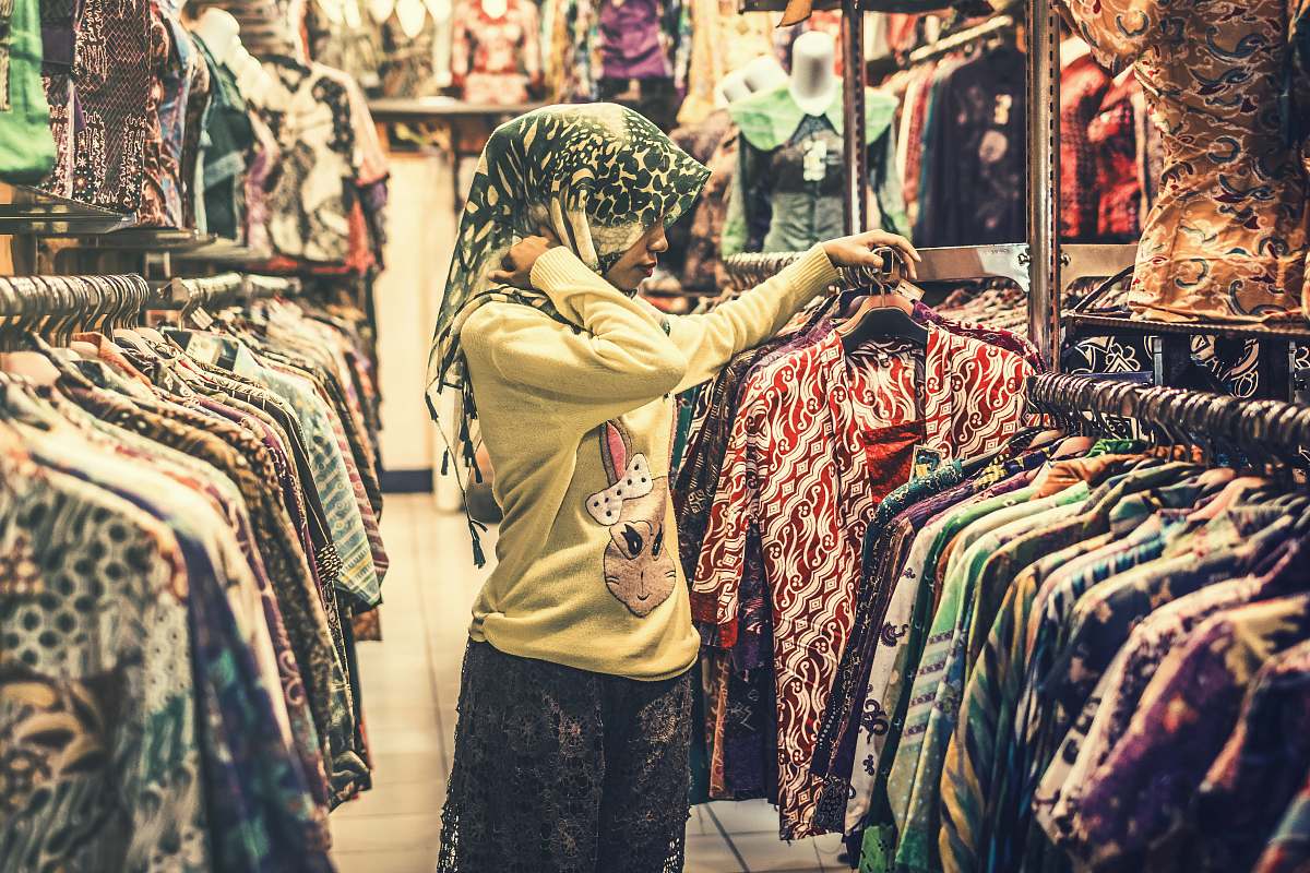 clothing woman wearing yellow long-sleeved shirt apparel