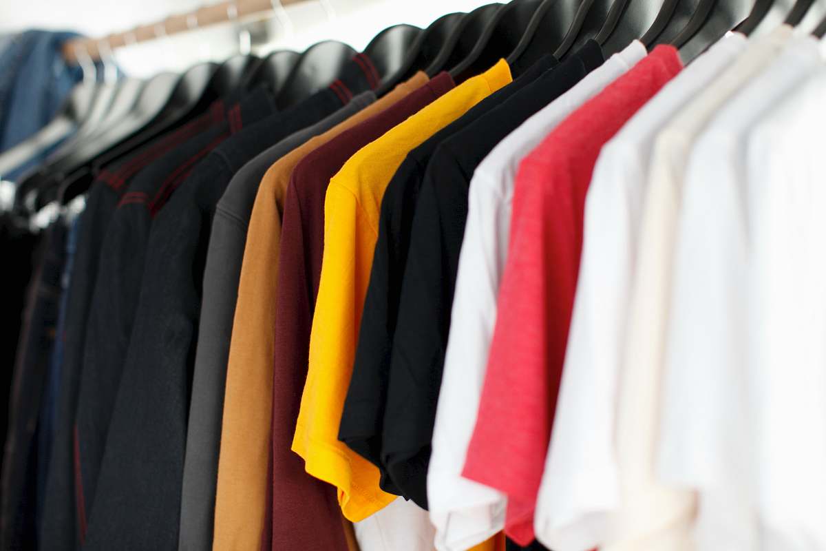 clothing closeup of hanged shirts on rack shirt