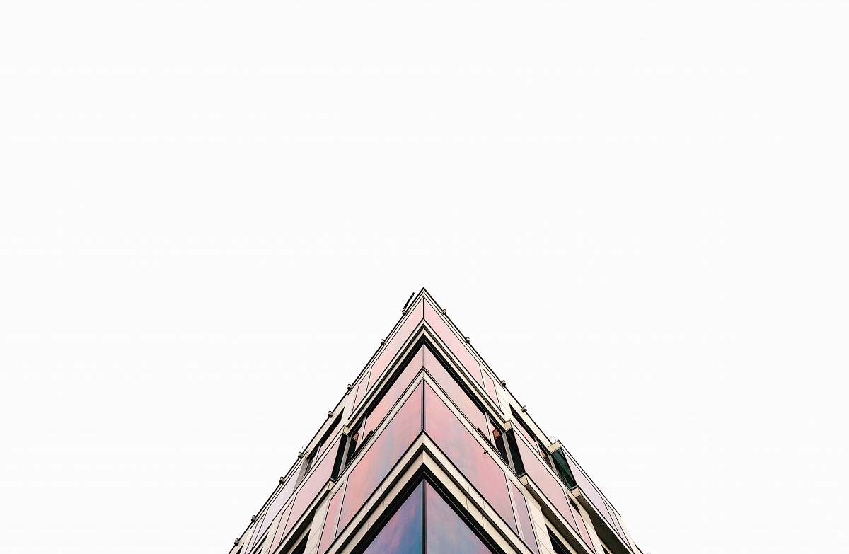 architecture The corner of a building facade in Krakow against a white sky facade