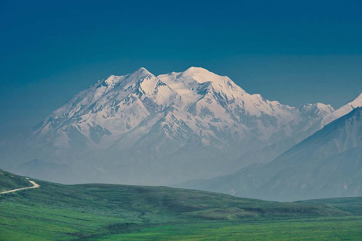 nature grass field and glacier mountain mountain range