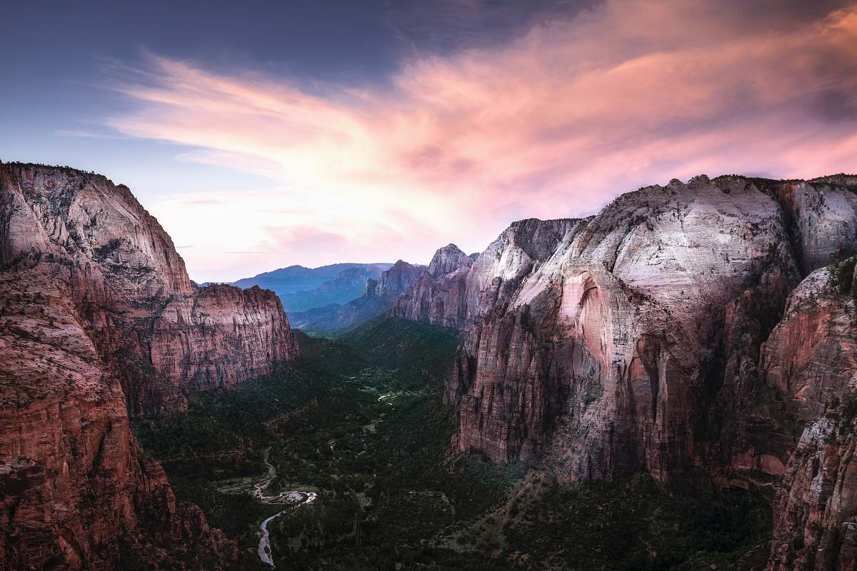 outdoors river under rock mountains valley