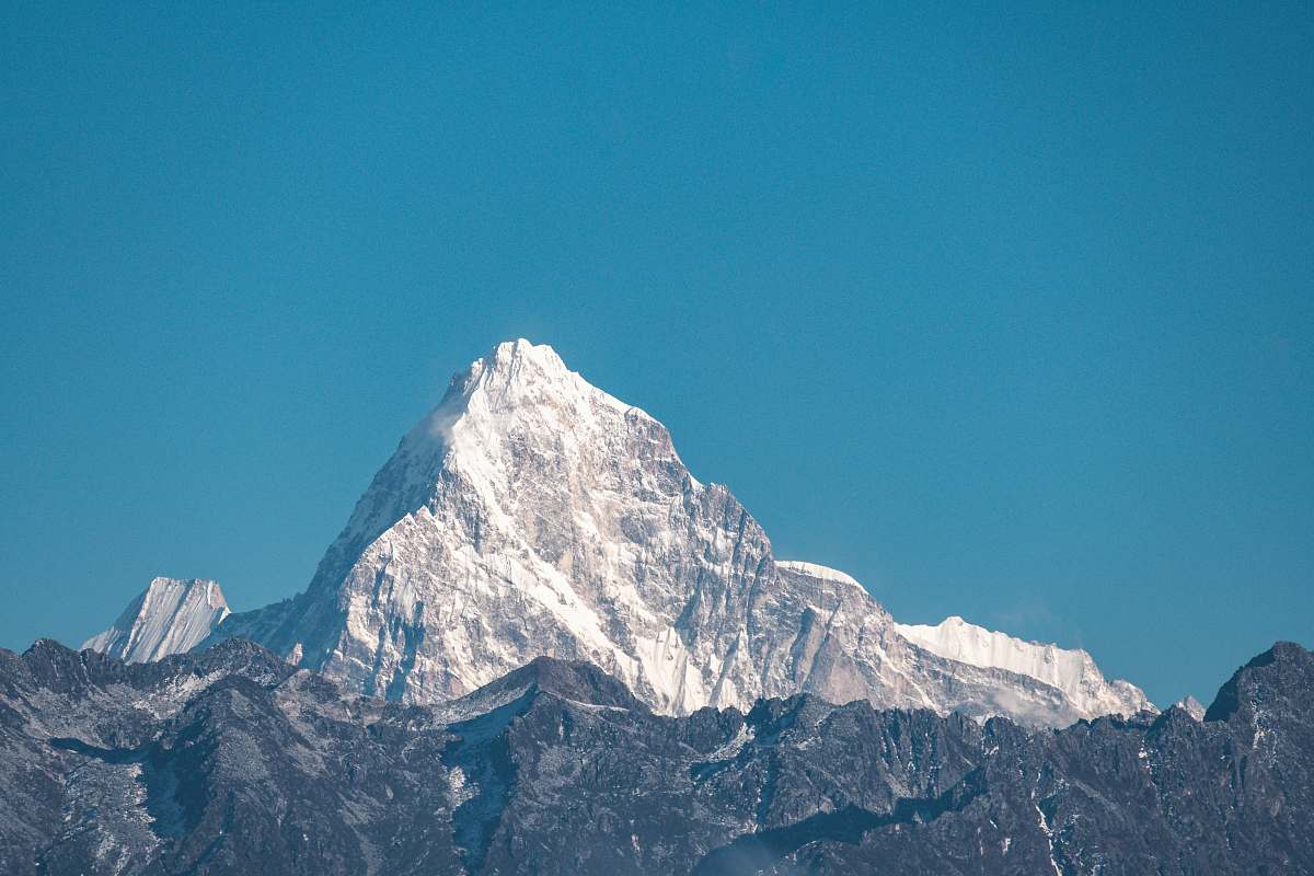nature snow covered mountain during daytime mountain range