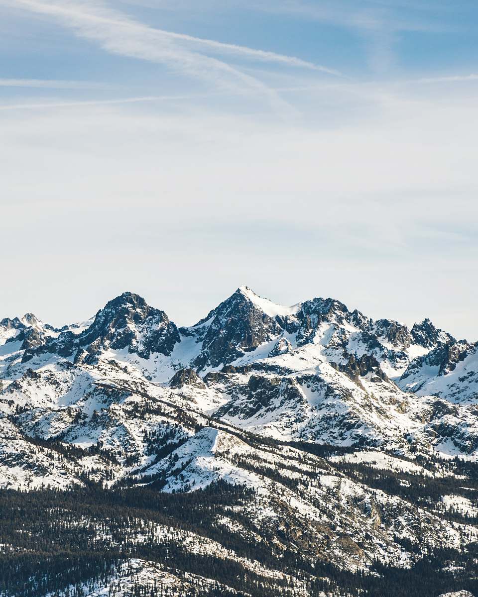 mountain mountain under white and blue sky mountain range