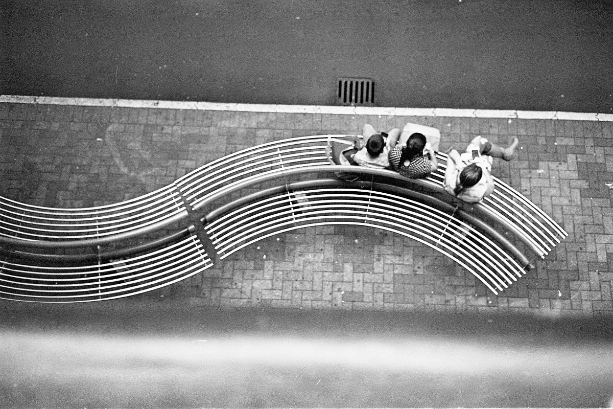 aerial photography of persons sitting on bench