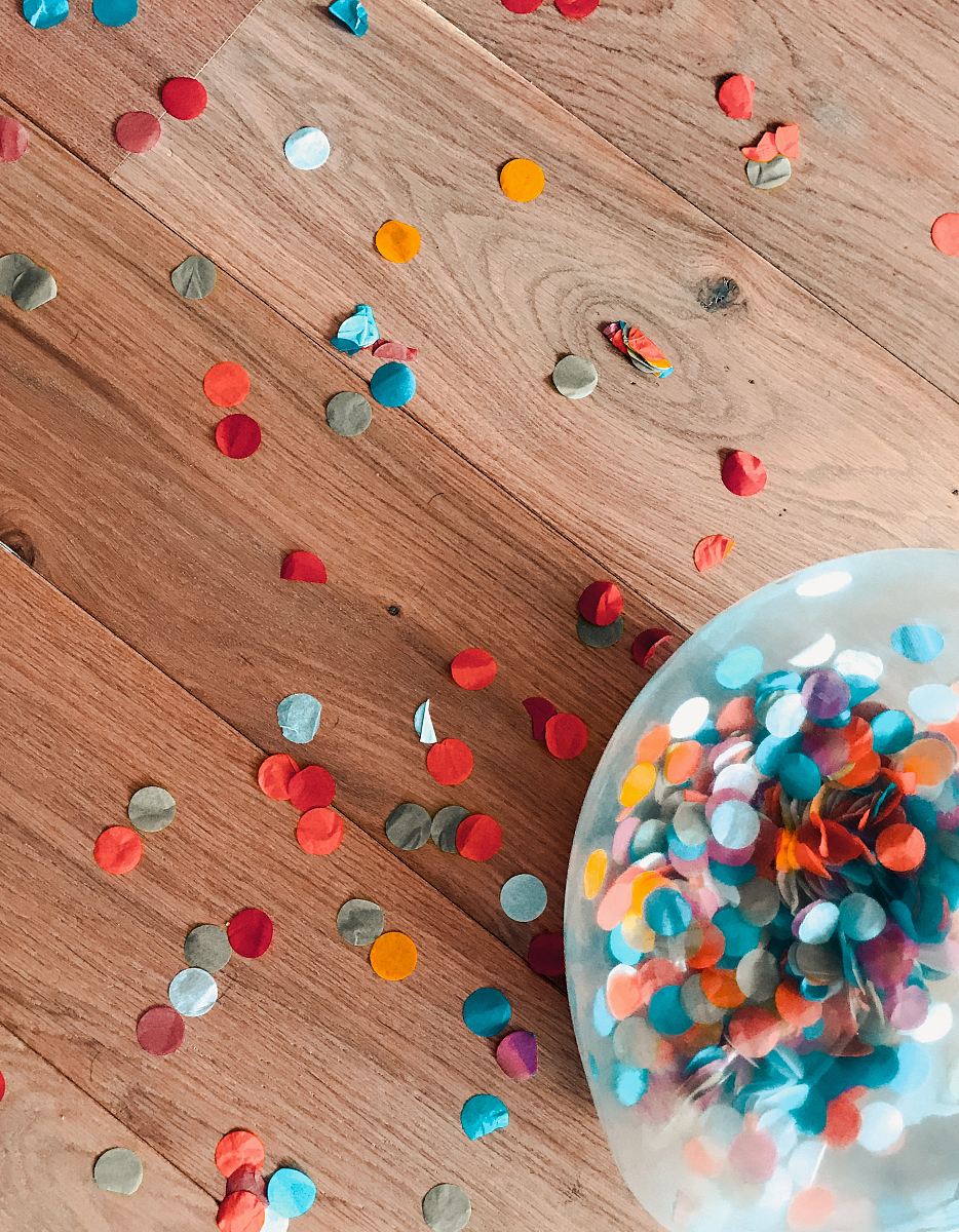 assorted-color of sprinkle dots on brown floor