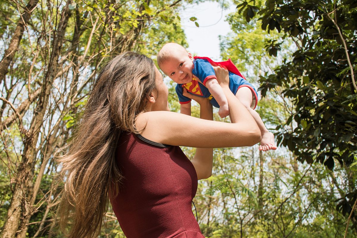 woman carrying baby
