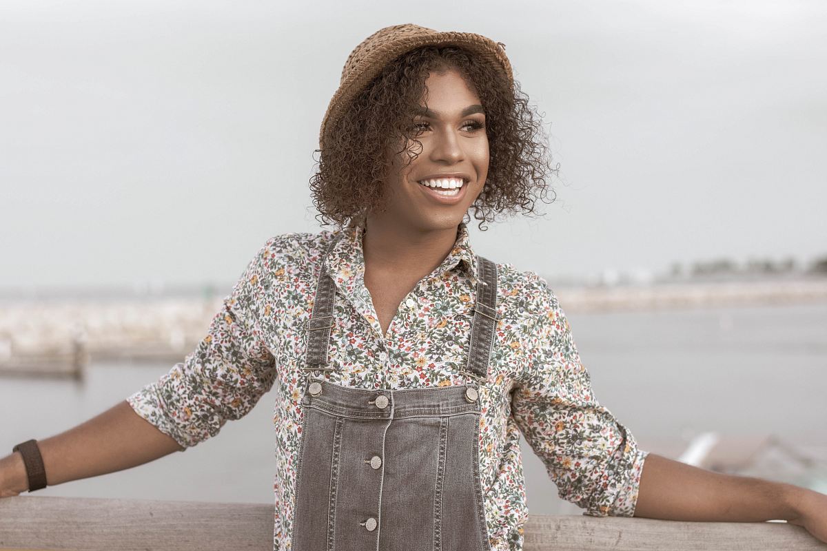 woman in gray overalls