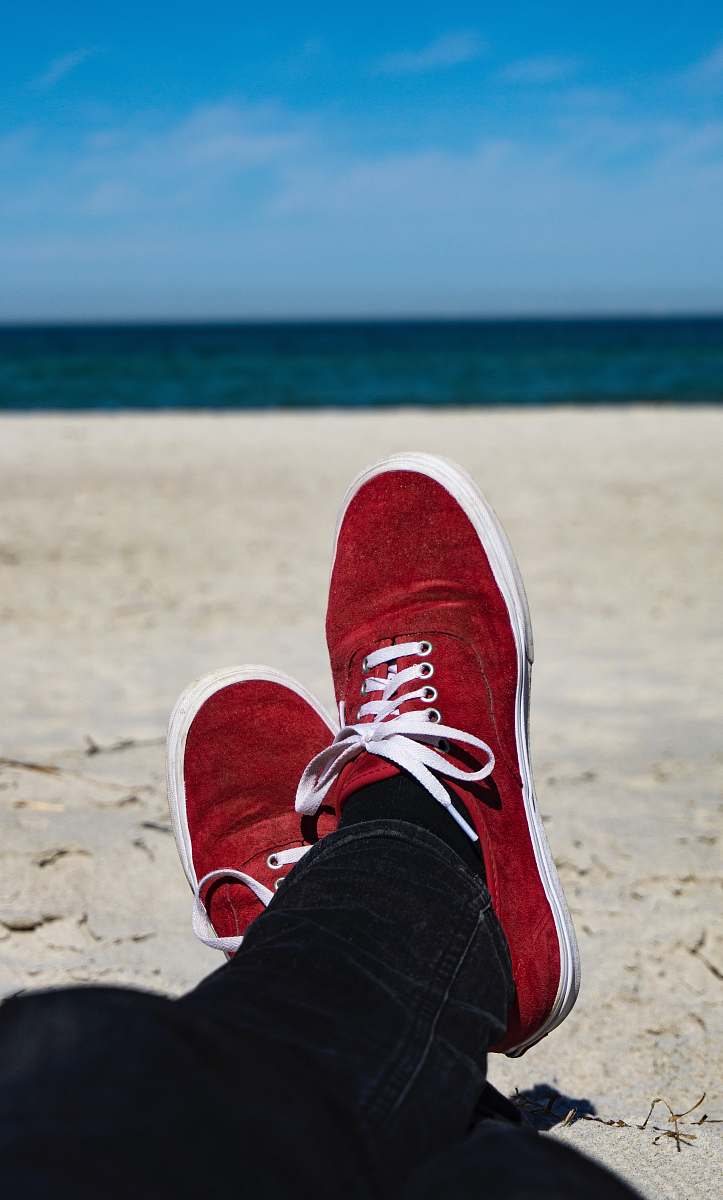 clothing person on seashore shoe
