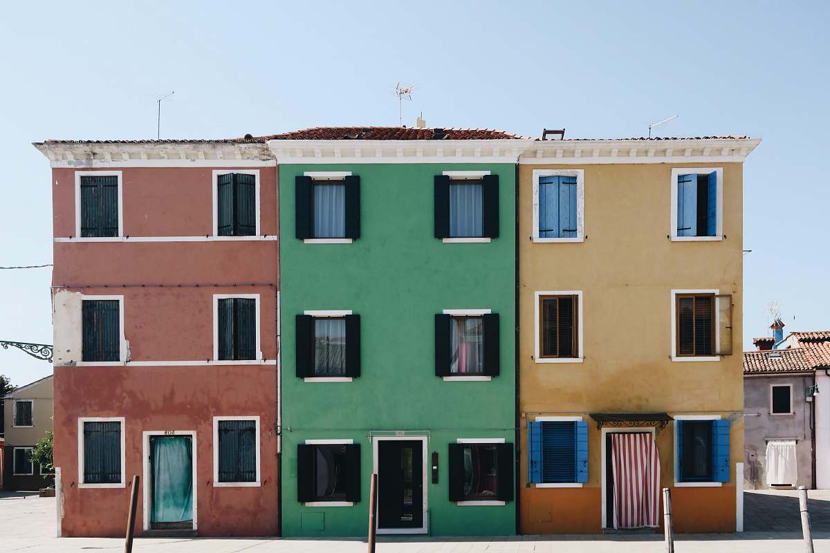 town brown, green, and red houses urban