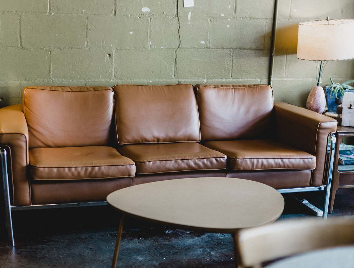couch brown leather 3-seat sofa coffee table