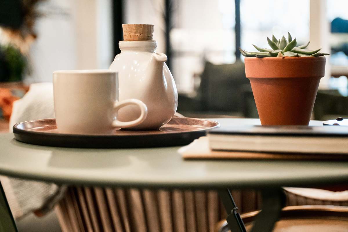 drink white cup beside teapot on tray beverage