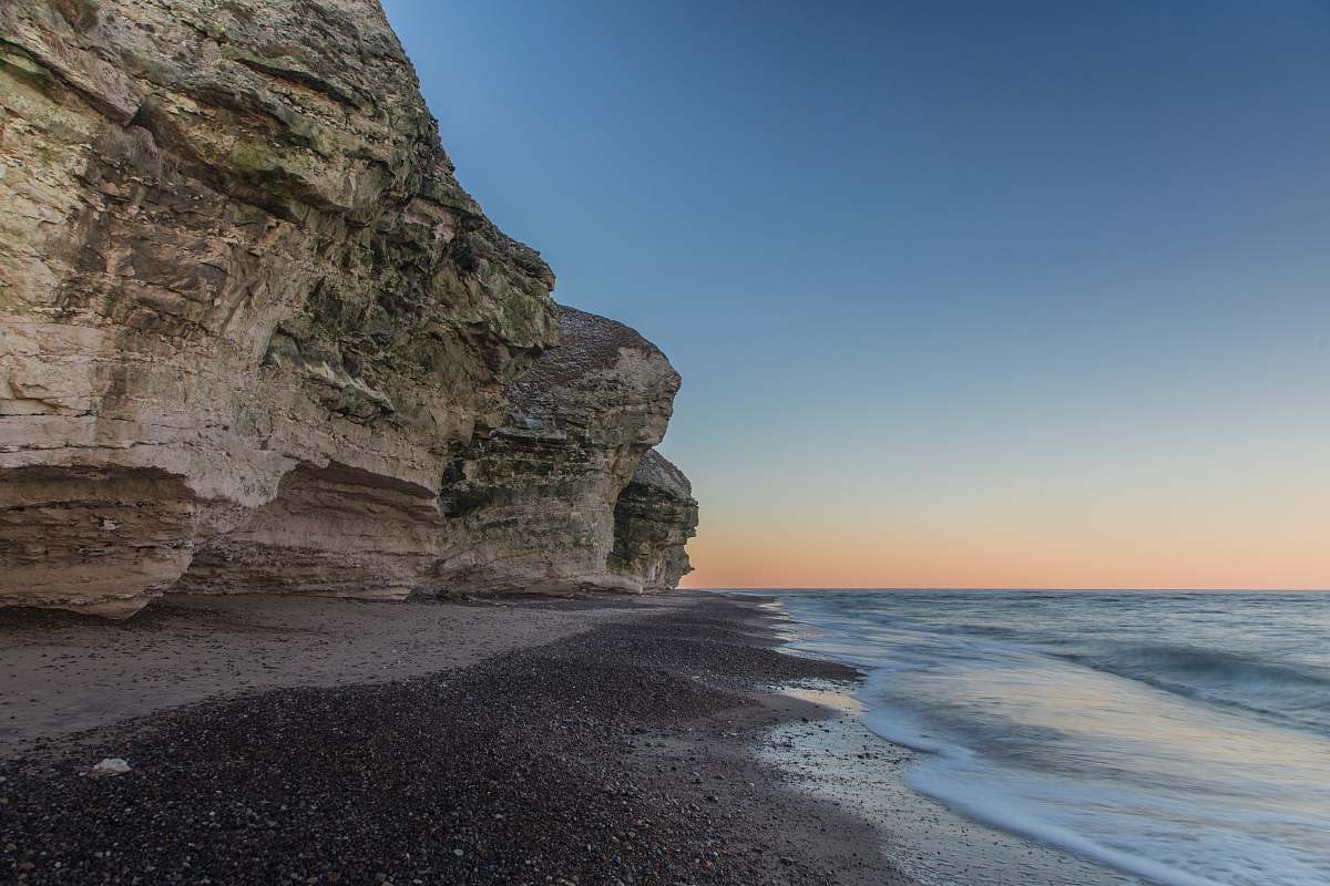 nature rock formation near ocean cliff