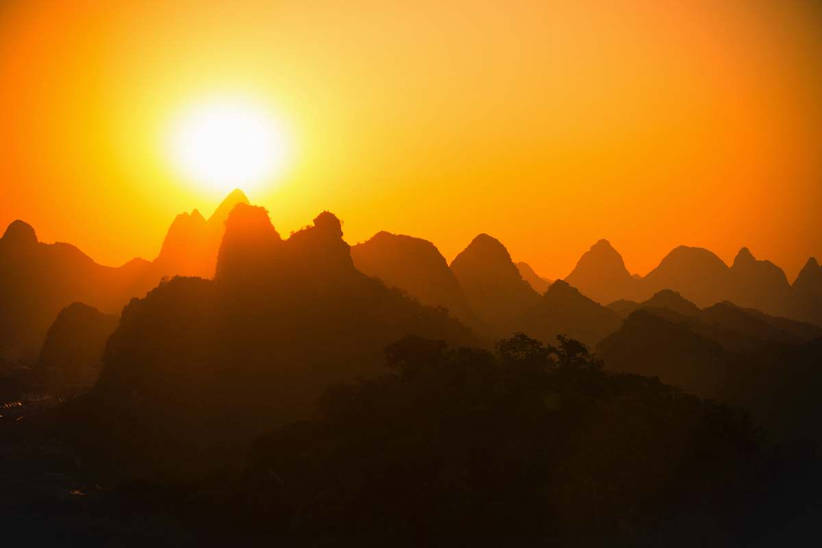 sunset mountain silhouette silhouette during golden hour sunrise