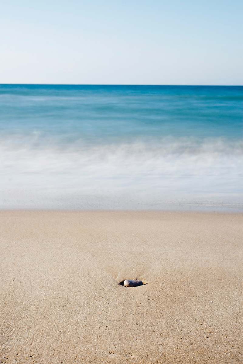 ocean seashore during daytime beach