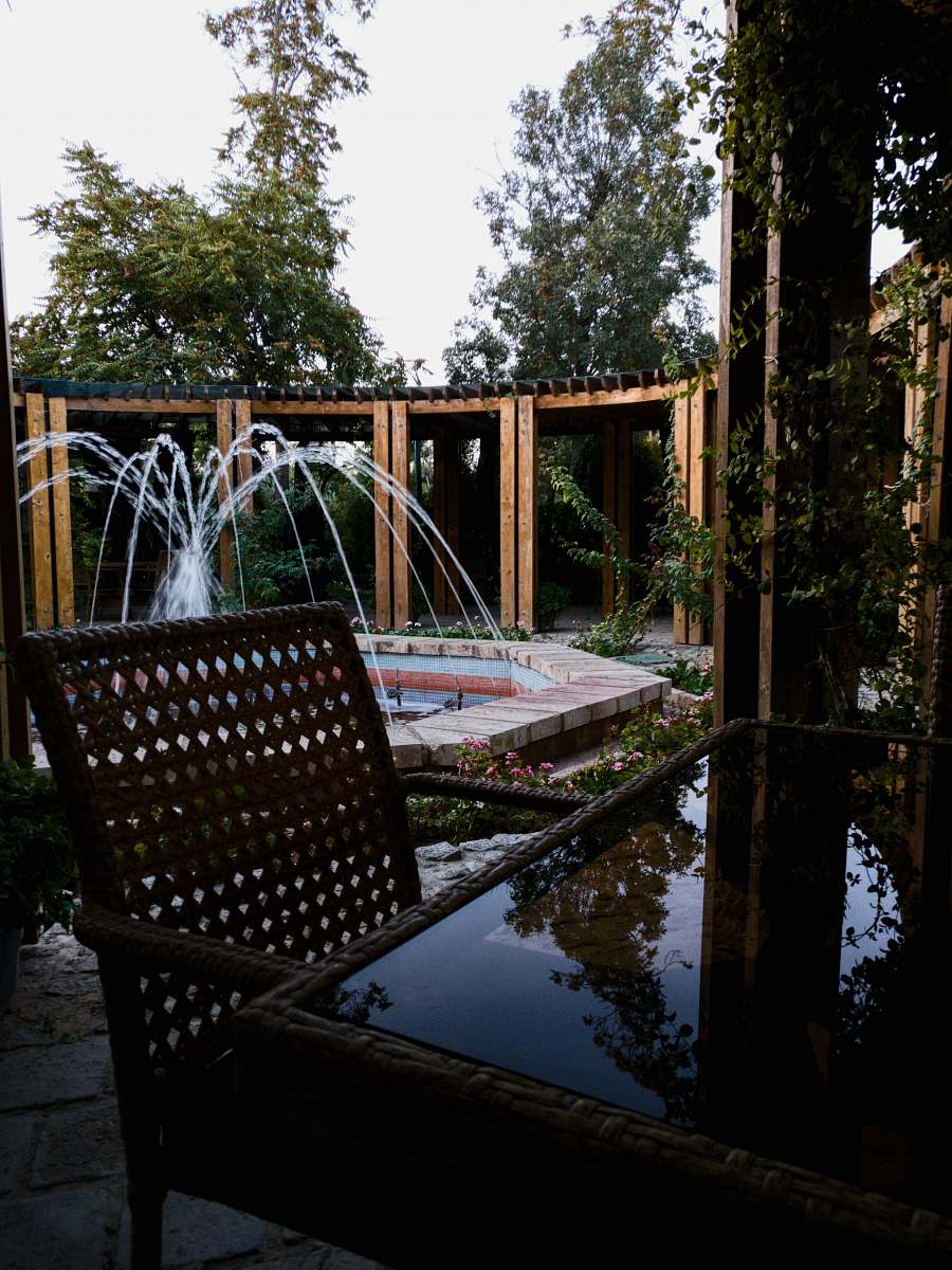 patio shallow focus photo of outdoor water fountain porch