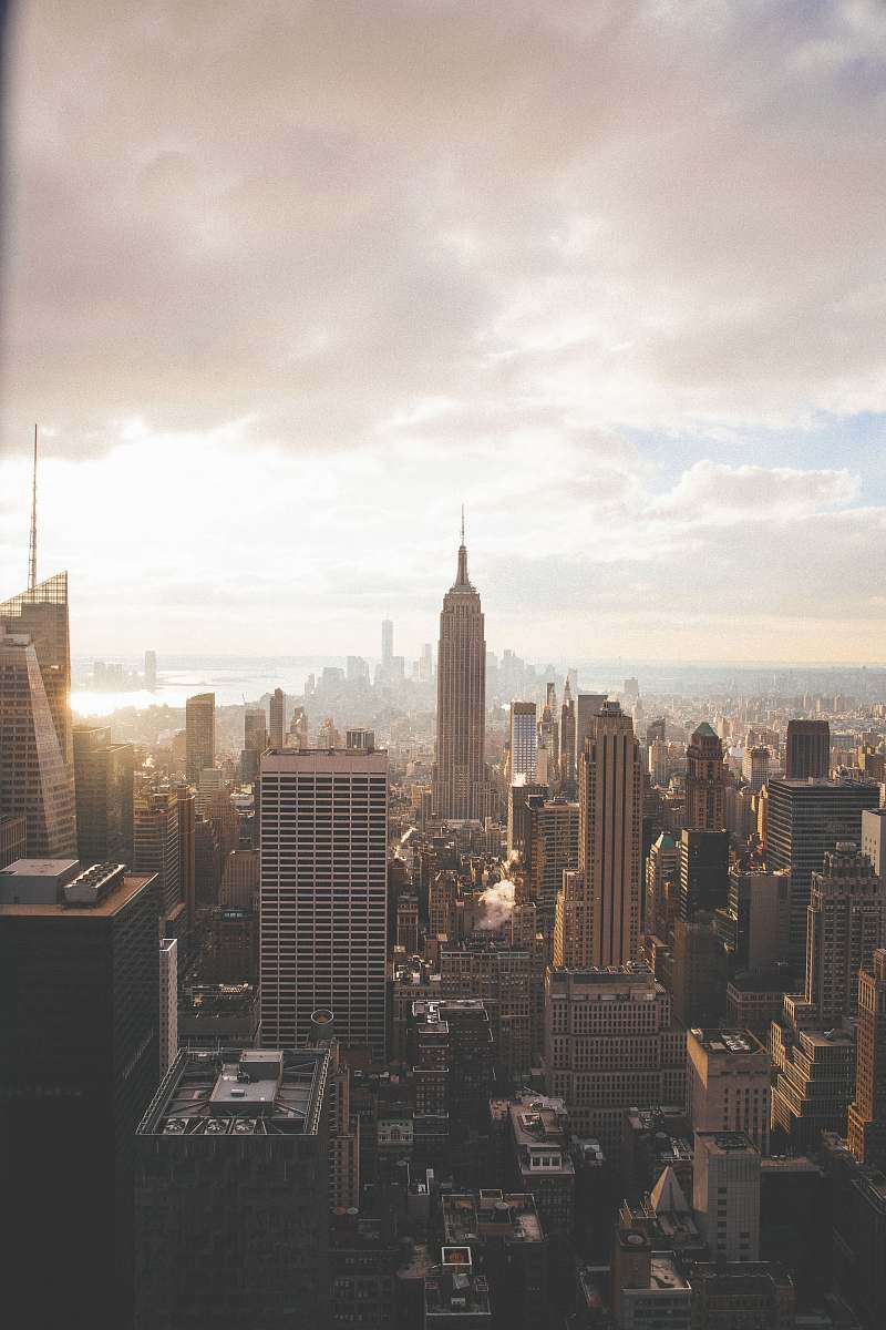 urban Empire State Building under cloudy sky building