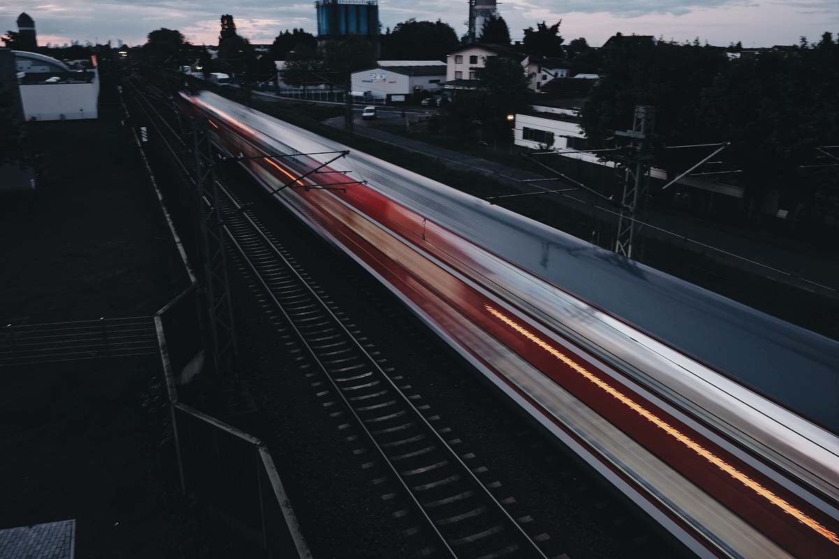 transportation time lapse photography of train vehicle