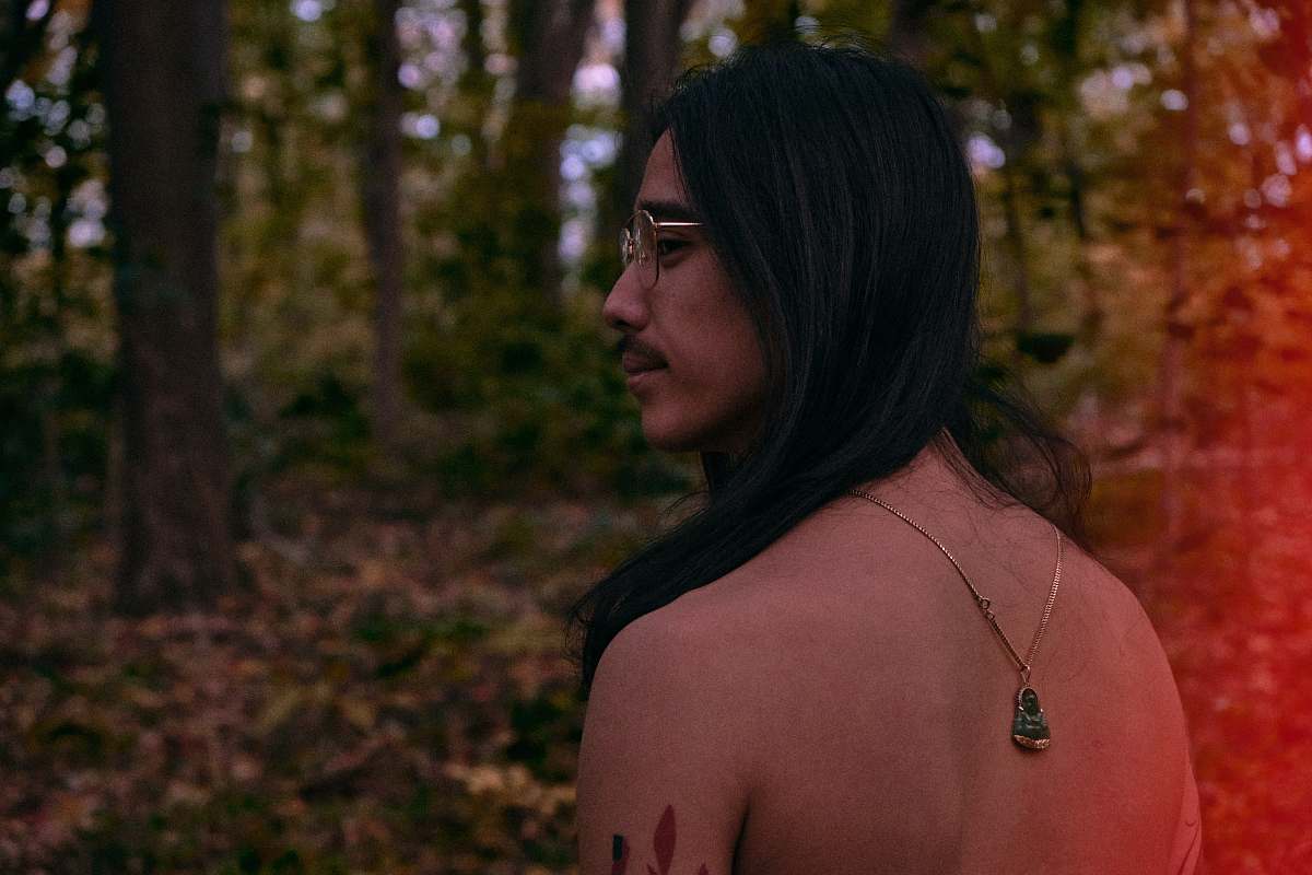 person topless woman wearing silver necklace mount royal